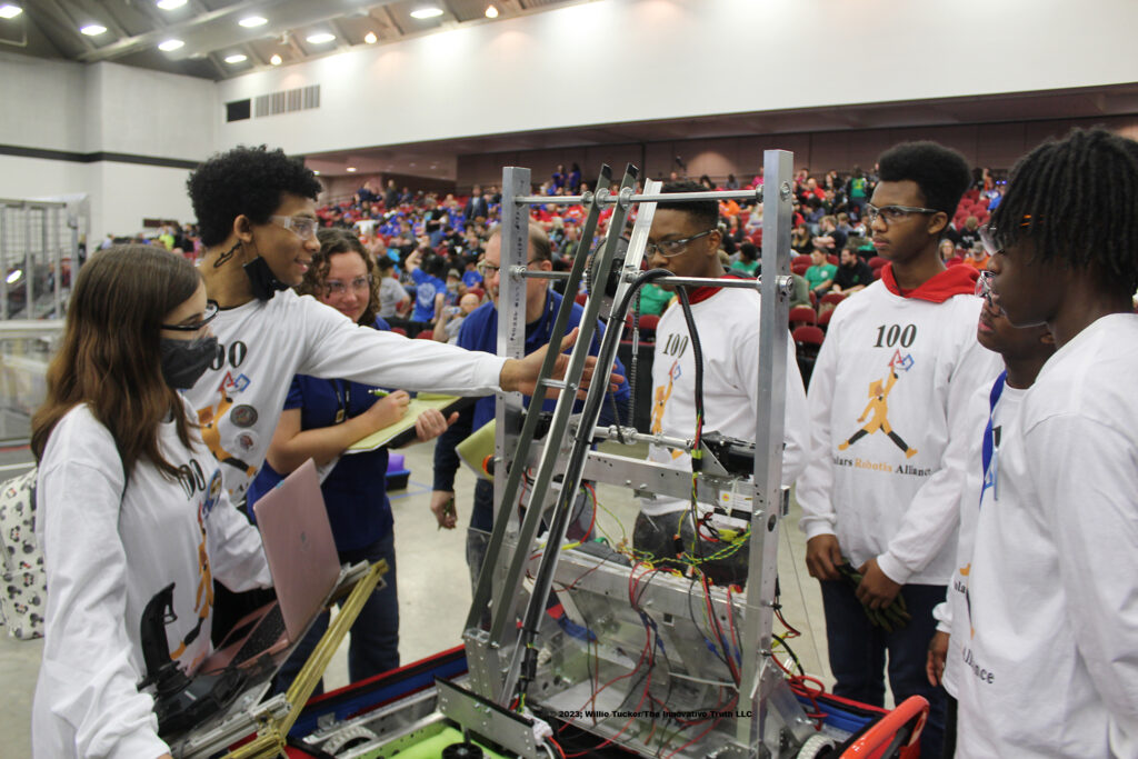 Students performing a robotics competition