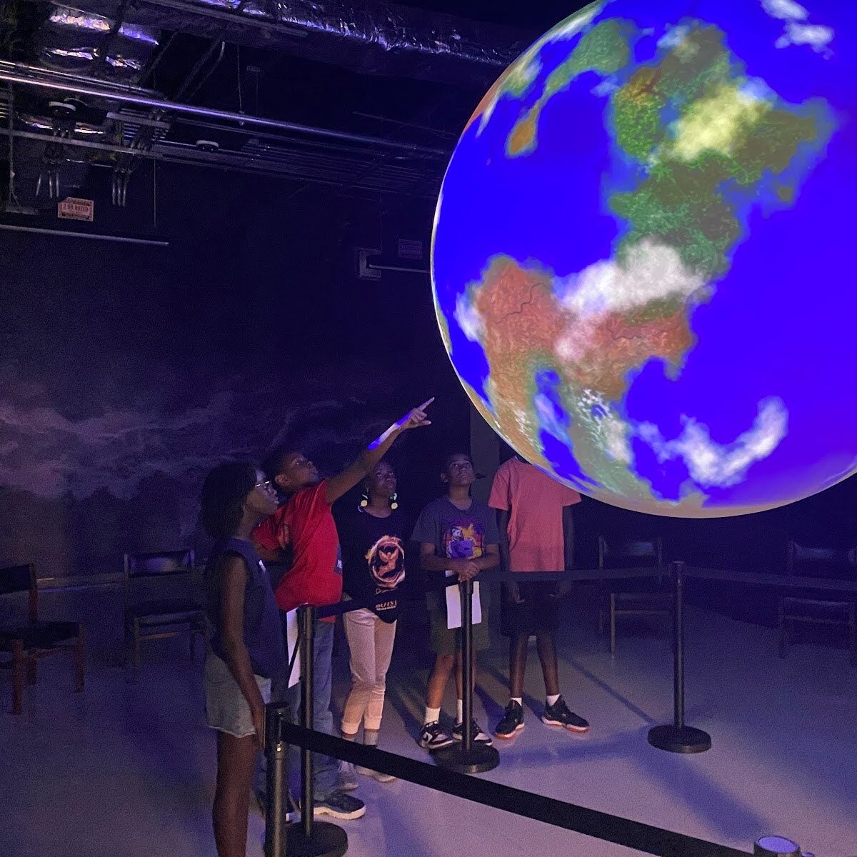 Children Looking at the Science On A Sphere